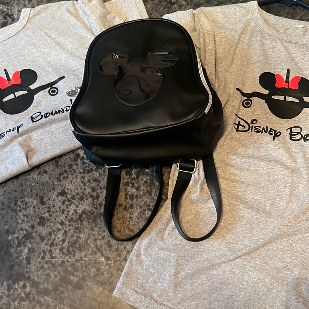 2 brand new, medium Disney bound tshirts and brand new pin collector backpack